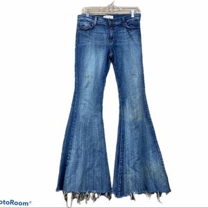 Free people medium wash flare raw hem jeans